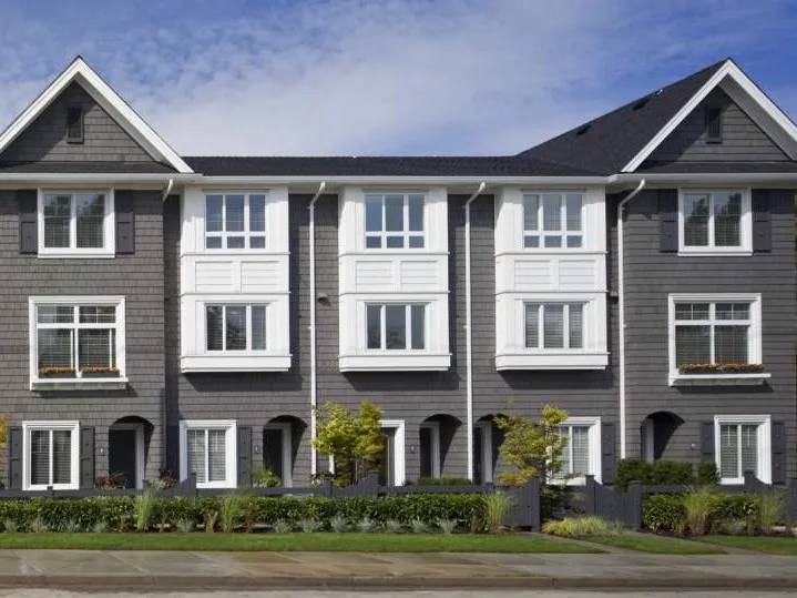 Completed Fleetwood Village townhomes with window shades installed, Surrey
